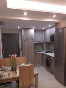 Kuchyňa alebo kuchynka v ubytovaní Apartamentos Vacacionales Joctis, 2º A
