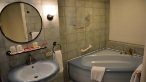 Koupelna v ubytování Deja Vu Hotel