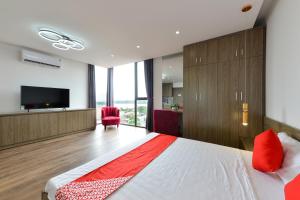 TV a/nebo společenská místnost v ubytování BH Riverside Hotel