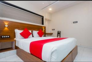 Postel nebo postele na pokoji v ubytování Hotel Arma Residency