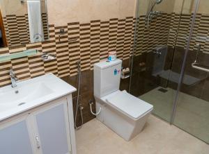 A bathroom at MRD Beach Hotel