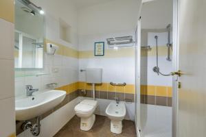 Ett badrum på Badia Rooms & Breakfast