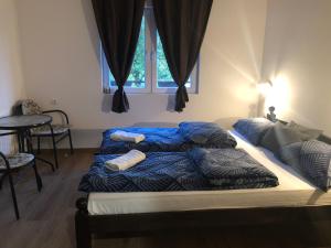 Katil atau katil-katil dalam bilik di Country house Plitvice