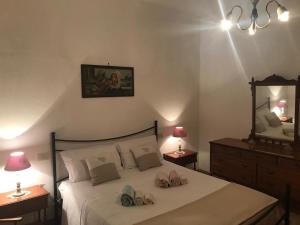 Tempat tidur dalam kamar di Agriturismo Pagiano