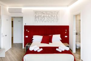 Voodi või voodid majutusasutuse Le Muse Suite toas
