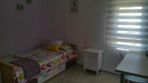 Posteľ alebo postele v izbe v ubytovaní Duplex en Huelva a 15 minutos en coche de las mejores playas de España