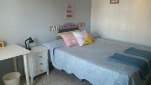 Posteľ alebo postele v izbe v ubytovaní Duplex en Huelva a 15 minutos en coche de las mejores playas de España