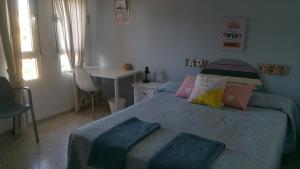 Posteľ alebo postele v izbe v ubytovaní Duplex en Huelva a 15 minutos en coche de las mejores playas de España