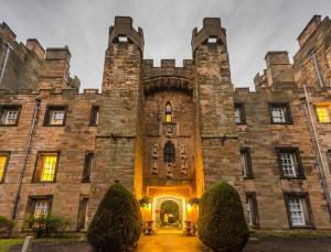 a large stone building with a large entrance at Washington's Hidden Gem Amethyst 3 Bedroom House in Washington