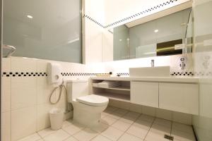 Koupelna v ubytování Yu Chun Hotel