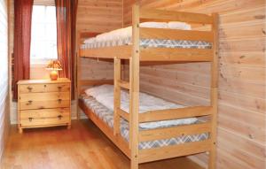 Ένα ή περισσότερα κρεβάτια σε δωμάτιο στο 5 Bedroom Gorgeous Home In Lindesnes +2 φωτογραφίες