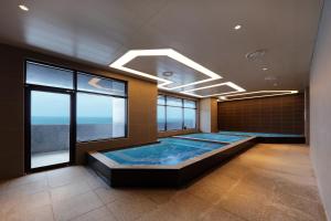 La alberca dentro o cerca de Mercure Ambassador Ulsan