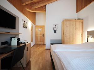 Voodi või voodid majutusasutuse Hotel Hubertus toas