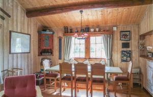 a dining room with a table and chairs at 3 Bedroom Beautiful Home In Hemsedal in Hemsedal