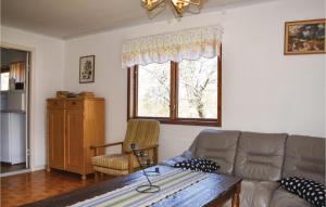Khu vực ghế ngồi tại 3 Bedroom Beautiful Home In Löttorp