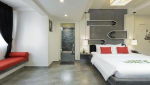 Postel nebo postele na pokoji v ubytování Central Suite Residence