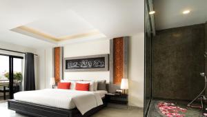 Postel nebo postele na pokoji v ubytování Central Suite Residence