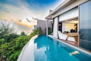 Bazén v ubytování Impiana Private Villas Kata Noi nebo v jeho okolí