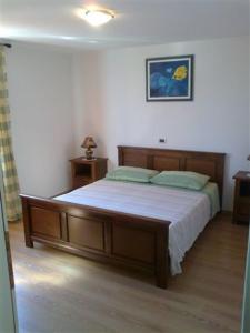 Ένα ή περισσότερα κρεβάτια σε δωμάτιο στο Apartments Edo