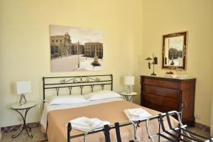 Posteľ alebo postele v izbe v ubytovaní B&B al Teatro Massimo