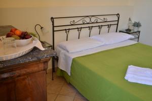 Posteľ alebo postele v izbe v ubytovaní B&B al Teatro Massimo