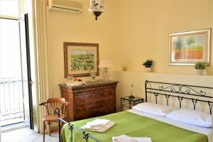 Posteľ alebo postele v izbe v ubytovaní B&B al Teatro Massimo