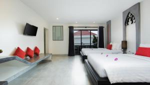 Postel nebo postele na pokoji v ubytování Central Suite Residence