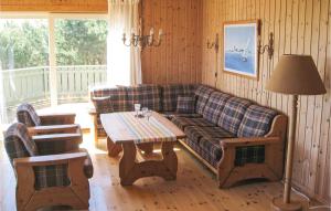Posezení v ubytování 3 Bedroom Amazing Home In Rygge