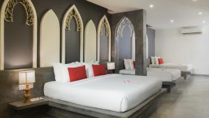 Postel nebo postele na pokoji v ubytování Central Suite Residence