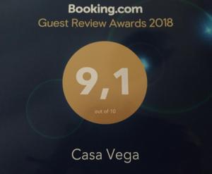 a sign that reads guest review awards with a gold circle at Casa Vega in Sobradiel