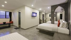 Postel nebo postele na pokoji v ubytování Central Suite Residence