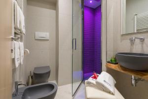 Koupelna v ubytování Hotel Ghirlandina + 35 fotografií