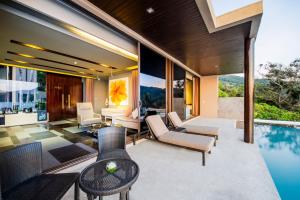 Bazén v ubytování Impiana Private Villas Kata Noi nebo v jeho okolí