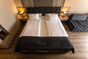 
Postelja oz. postelje v sobi nastanitve Gostilna in motel Pri Lešniku
