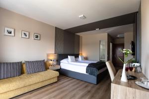 Postel nebo postele na pokoji v ubytování Gostilna in motel Pri Lešniku + 37 fotografií