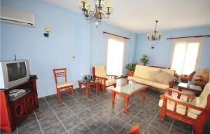 Predel za sedenje v nastanitvi Amazing Home In Pegia-paphos With 3 Bedrooms, Wifi And Outdoor Swimming Pool