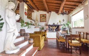 a living room with a statue of a woman on the wall at Casale Petrucci in Vacone