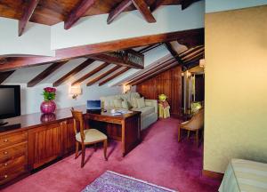 TV a/nebo společenská místnost v ubytování Hotel Palazzo Stern