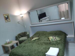 
Кровать или кровати в номере ЛИМОН на Шостаковича
