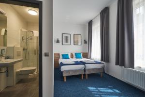 Ванная комната в Fama Residence Gdańsk Old Town