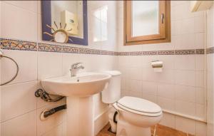 A bathroom at Beautiful Home In Sant Miquel Daro