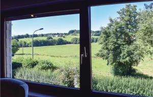 a view of a field from a window at 2 Bedroom Nice Home In Sellerich in Sellerich