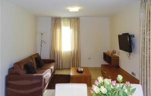 A seating area at Stunning Apartment In Lasko With Kitchen