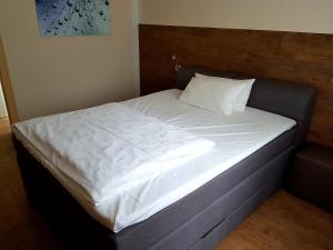 Postel nebo postele na pokoji v ubytování Hotel PrimaVera parco