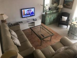 Telewizja i/lub zestaw kina domowego w obiekcie La Aurora