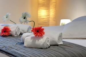 A bed or beds in a room at Borgo Apartment by Mamo Florence