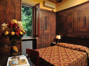 Postel nebo postele na pokoji v ubytování Hotel Bonconte + 37 fotografií