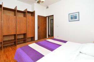 Łóżko lub łóżka w pokoju w obiekcie Apartment Milka 1950