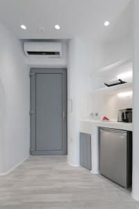 Kuchyň nebo kuchyňský kout v ubytování Majestique of Naxos luxury suites