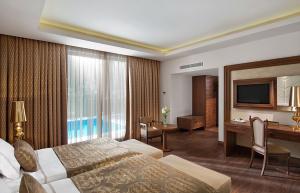 Postel nebo postele na pokoji v ubytování Akka Antedon Hotel - Premium Ultra All Inclusive